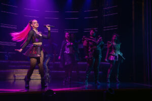 Abigail Barlow as Katherine Howard and the cast of SIX: The Musical.
© Joan Marcus