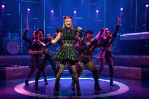 Dylan Mulvaney as Anne Boleyn and the cast of SIX: The Musical.
© Joan Marcus