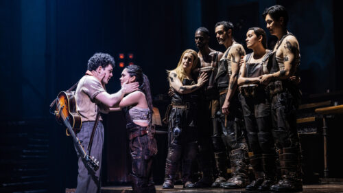 Ali Louis Bourzgui as Orpheus, Myra Molloy as Eurydice and the cast of Hadestown. © Matthew Murphy