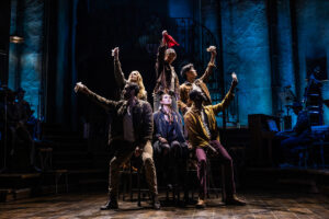 Myra Molloy as Eurydice and the cast of Hadestown
© Matthew Murphy