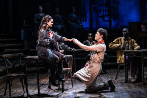 Myra Molloy as Eurydice, Ali Louis Bourzgui and the cast of Hadestown.
© Matthew Murphy