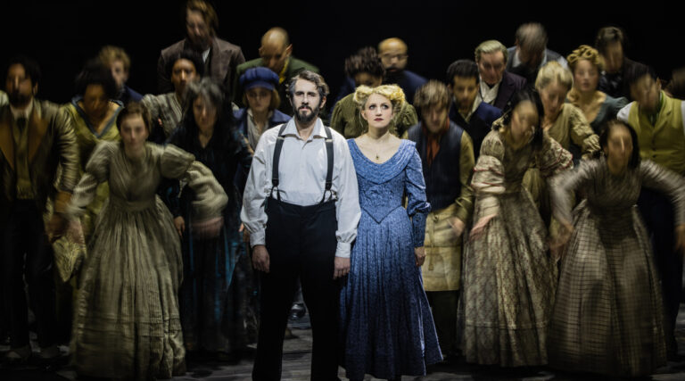 Josh Groban and Annaleigh Ashford surrounded by crowd.