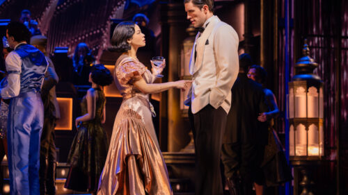 Eva Noblezada as Daisy Buchanan and John Zdrojeski as Tom Buchanan in The Great Gatsby.