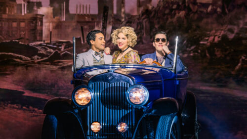 Noah J. Ricketts as Nick Carraway, Sara Chase as Myrtle Wilson and John Zdrojeski as Tom Buchanan in The Great Gatsby.