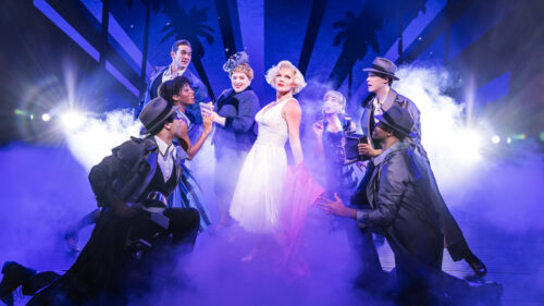 Robyn Hurder as Ivy and the cast of Smash. © Matthew Murphy