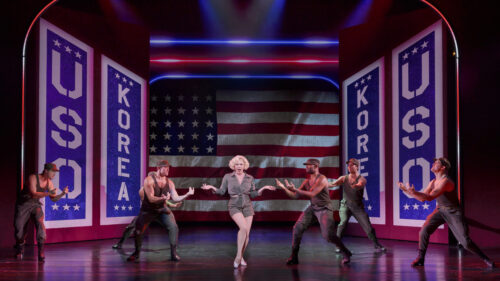 Robyn Hurder as Ivy and the cast of Smash © Paul Kolnik