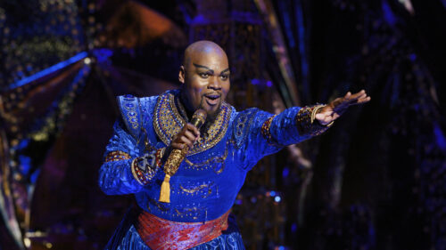 Michael James Scott as Genie in Aladdin.