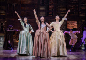 Stephanie Jae Park as Eliza, Jennie Harney-Fleming as Angelica and Yana Perrault as Peggy in Hamilton.
© Joan Marcus