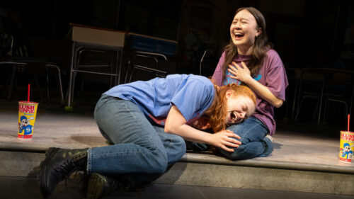 Sadie Sink as Shelby Holcomb and Amalia Yoo as Raelynn Nix in John Proctor is the Villain. © Julieta Cervantes