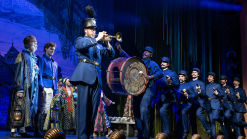 Preston Truman Boyd as Police Sergeant and the cast of PIrates! The Penzance Musical.
