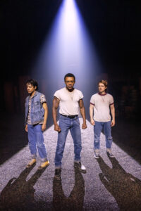 Sky Lakota-Lynch as Johnny Cade, Alex Joseph Grayson as Dallas Winston and Trevor Wayne as Ponyboy Curtis in The Outsiders.
© Matthew Murphy