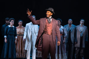 John Clay III as Booker T. Washington and the cast of Ragtime.
© Matthew Murphy