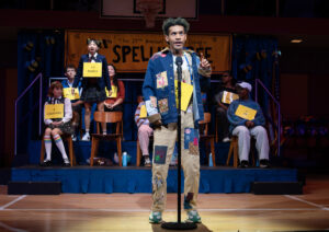 Justin Cooley as Leaf Coneybear and the cast of The 25th Annual Putnam County Spelling Bee.
© Joan Marcus